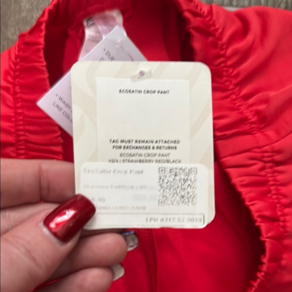 Fabletics Vibrant Red Eco Satin Cropped Pants with Black Accents - Picture 6 of 12